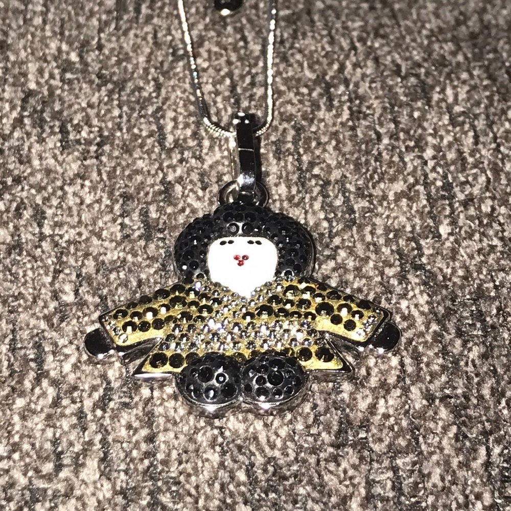 Signed Swarovski silver tone and crystal pendant.